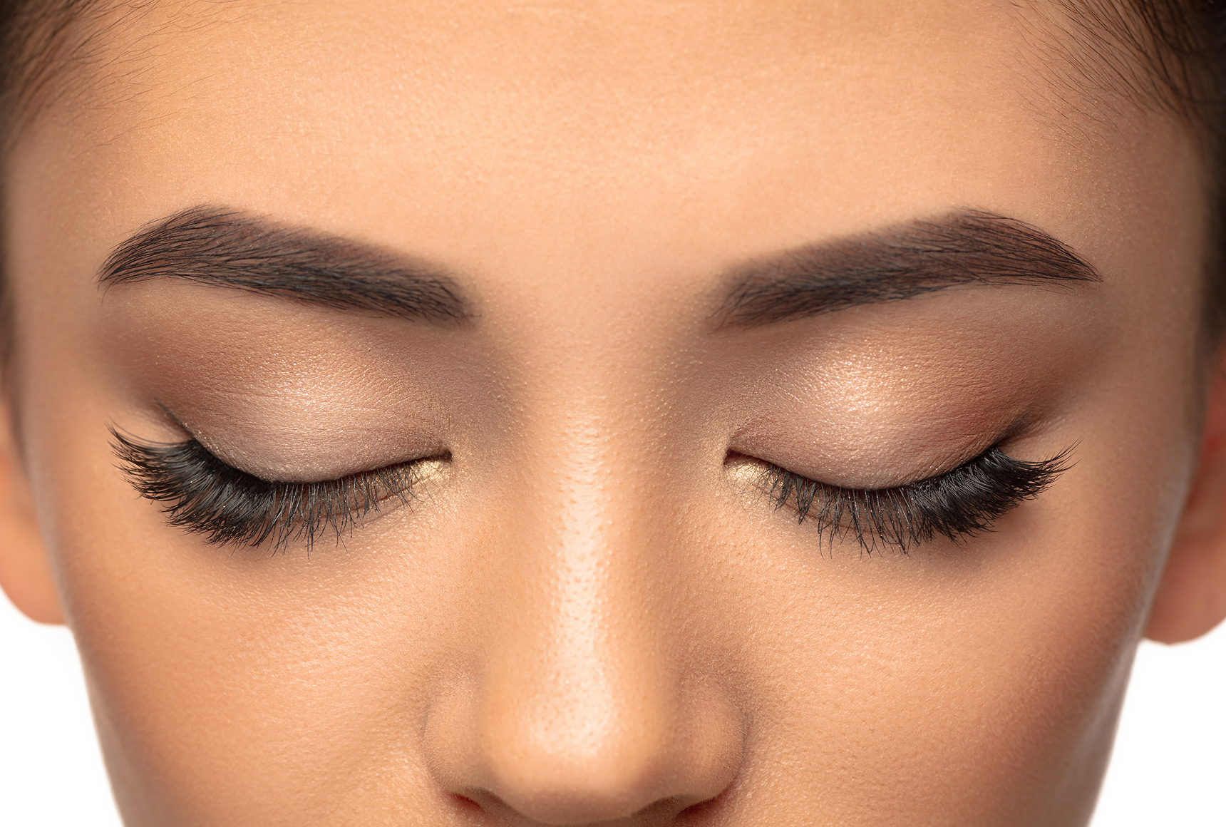 Close-up of eyes with long eyelash extensions