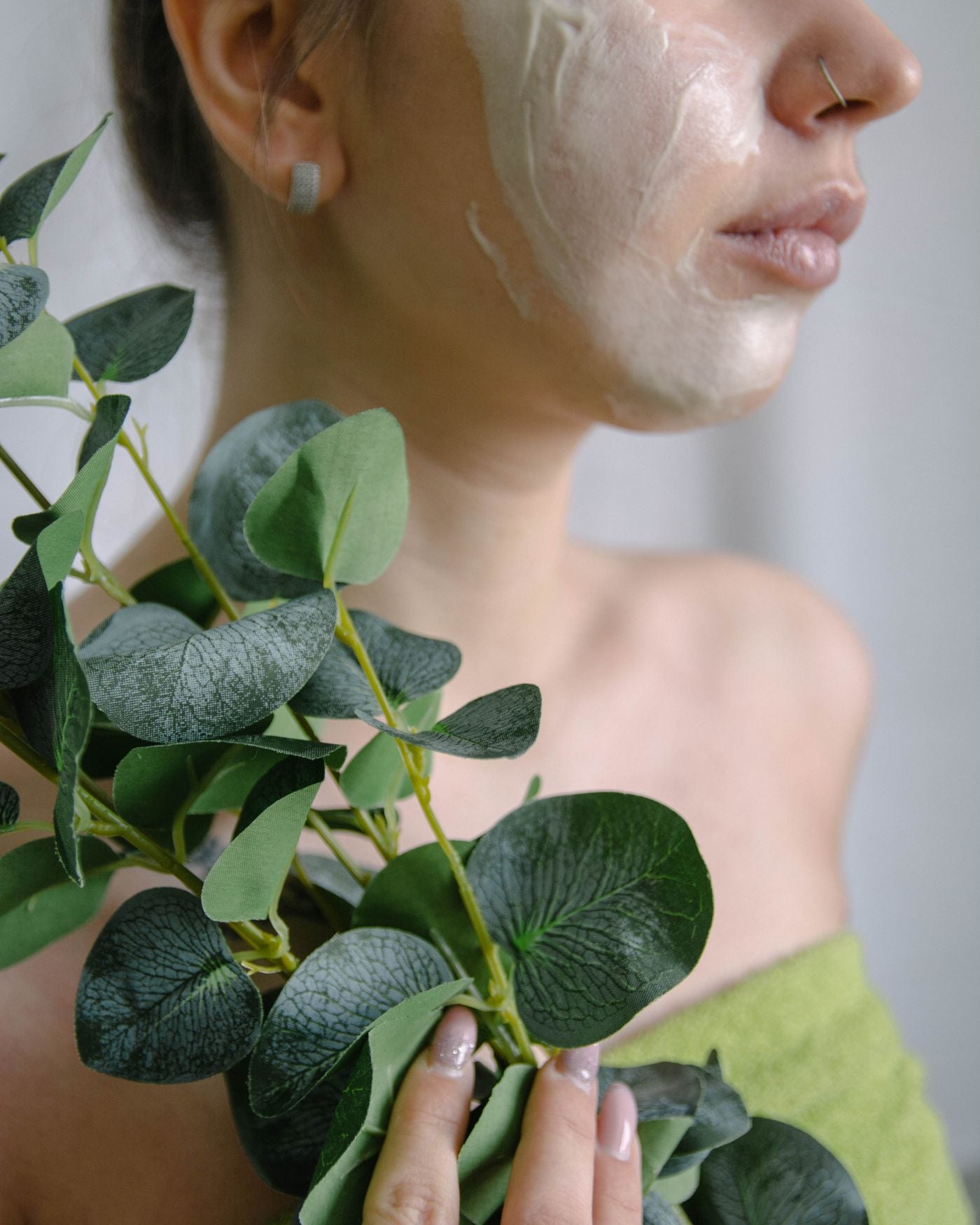 Woman applying face cream